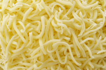 Closeup of fresh grated cheeseの写真素材