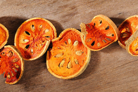 Bael Fruit tea on wooden backgroundの写真素材