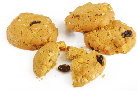 Oatmeal cookies with raisin on white background