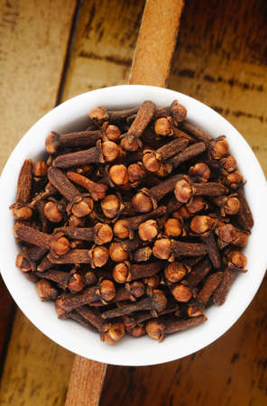 cloves on wooden backgroundの写真素材