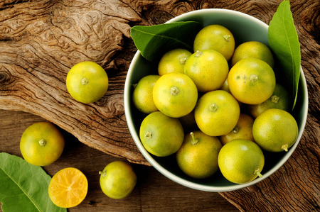 kumquat citrus fruits in bowlの写真素材
