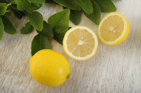 Fresh lemon on wooden backgroundの写真素材