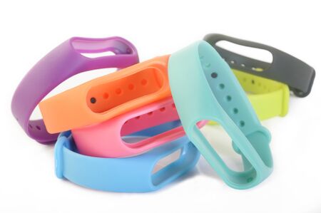 multicolored rubber wristband on white backgroundの写真素材