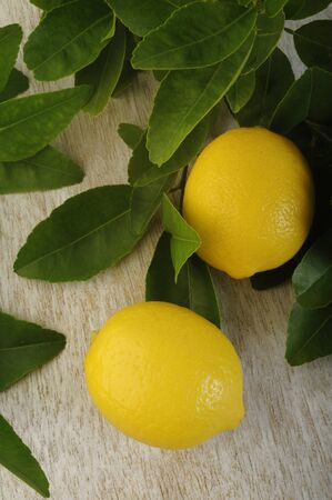 Fresh lemon on wooden backgroundの写真素材