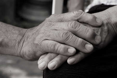 holding old handの写真素材