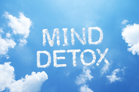 "MIND DETOX" cloud word on sky.の写真素材