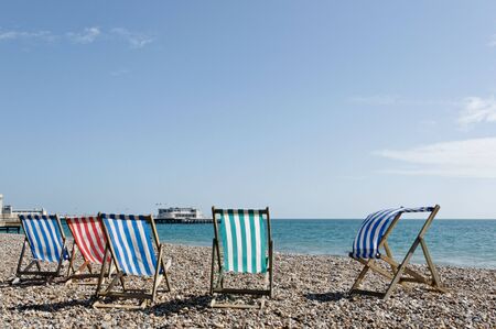 Deck-chairs on an english beachの写真素材