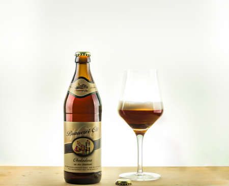 A bottle and a tasting glass of Obaladara beerのeditorial素材