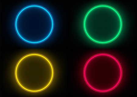 four glowing neon circles in blue, green, yellow, and red arranged in a grid against a dark background, vibrant light for a modern technology concept, perfect for product displays and creative mockupsのイラスト素材