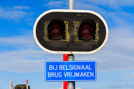 Bycicle bridge warning sign and lights to warn for closingの写真素材