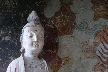 Maijishan Cave-Temple Complex in Tianshui city, Gansu Province China. A mountain with religious...