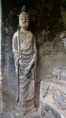 Maijishan Cave-Temple Complex in Tianshui city, Gansu Province China. A mountain with religious...