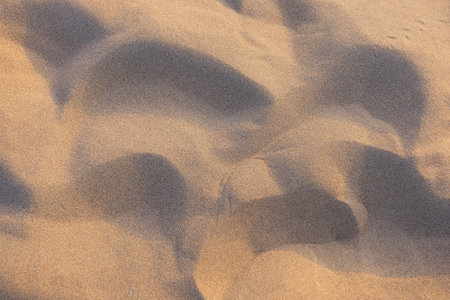 Desert sand under sunlight background texture image.の写真素材