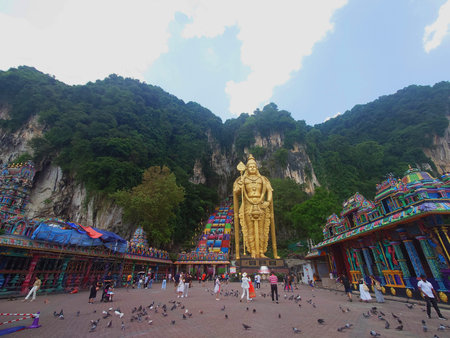 Golden Murugan Statue at Batu Caves Temple in Kuala Lumpur Malaysia