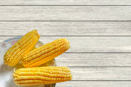 Corn on the wooden tableの写真素材