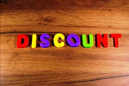 colored letters on wooden backgroundの写真素材