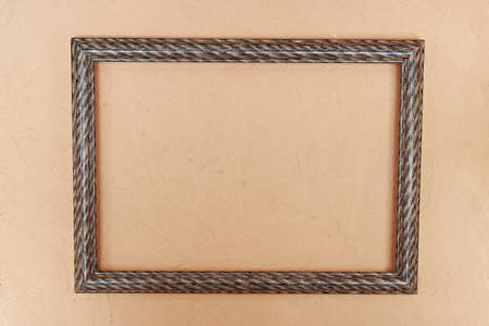 Photo frame with white image on pink wallの写真素材