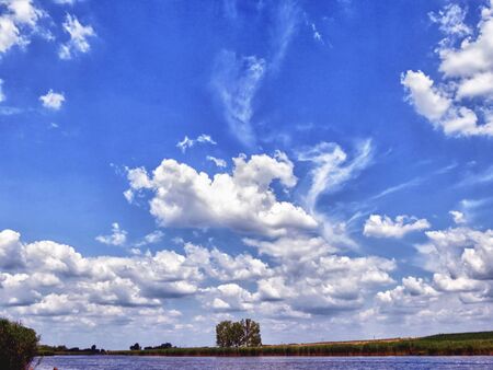 Clouds above lakeの写真素材