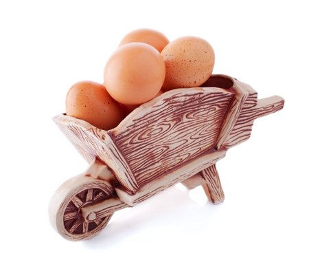 Ceramic cart Load with Eggs, Isolated on Whiteの写真素材