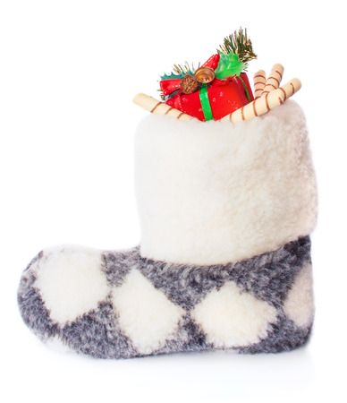 Warm Winter Boot with Christmas Candies and Gifts, Isolatedの写真素材