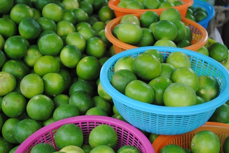The lime in the variety plastic basketの写真素材