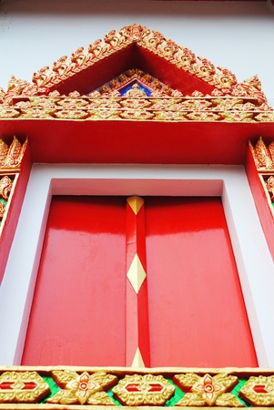 The beautiful window is beside of the churchの写真素材