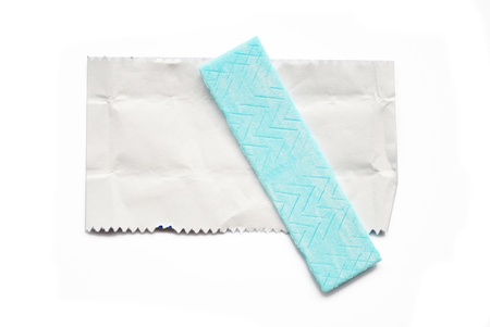 The chewing gum is on the white background with paperの写真素材