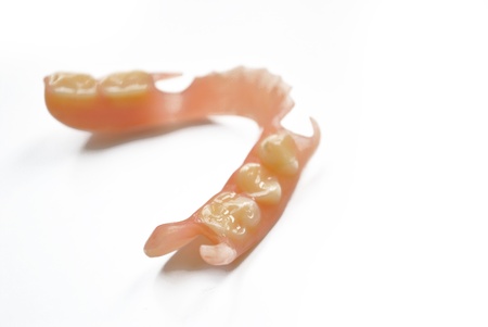 The false teeth is on the white background
