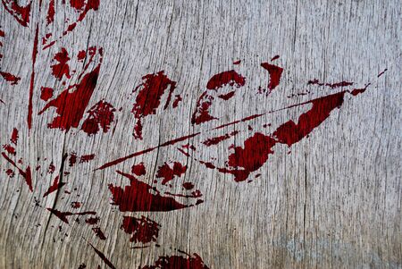 The painting leaf paint on the wood textureの写真素材