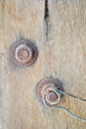 Wooden door planks and old metal  bolt screwの写真素材