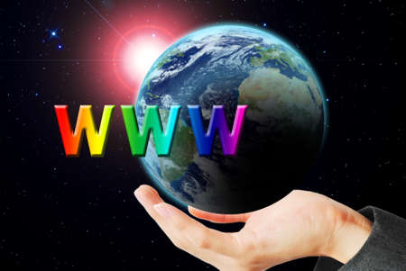 Hand hold the earth and sun ray with WWW wordの写真素材