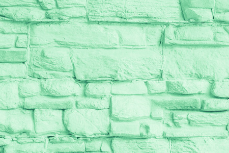 Pastel Green brick wall texture Interiors background. Gray cement,concrete brushed vintage painted...