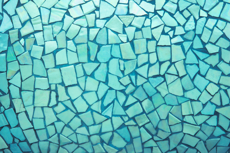 Broken tiles mosaic seamless pattern. Green tile real wall high resolution real photo or brick seamless with texture interior background. Abstract wallpaper irregular in bathroom.の写真素材