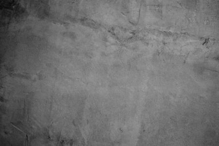 Art black concrete stone texture for background in black. Abstract color dry scratched surface wall...