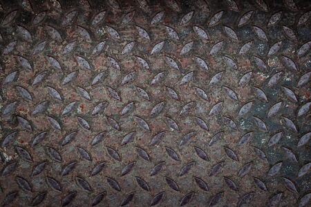 Industrial old rust metal steel list with rhombus shapes or checkered plates. Non-slip metal floor...
