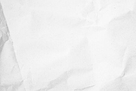White recycled craft paper texture as background. Grey paper texture, Old vintage page or grunge vignette. Pattern rough art creased grunge letter. Hardboard with copy space for text.の写真素材