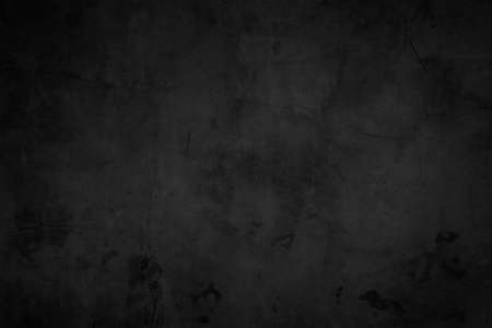 Close up retro plain dark black cement & concrete wall background texture for show or advertise or promote product and content on display.の写真素材