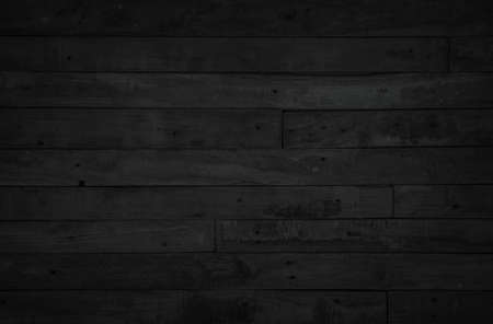 Black vintage painted wooden boards wall antique old style background. Grunge dark old wood texture and seamless for furniture design. Painted weathered peeling table wood hardwood decoration.の写真素材
