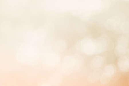 Abstract blurry cream color for background, Blur festival lights outdoor celebration and white bokeh focus texture decorative design elegant for winner.の写真素材