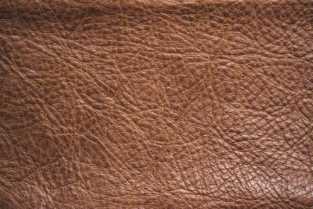 Genuine leather texture background. Dark brown, orange textures for decoration blank. Vintage skin...