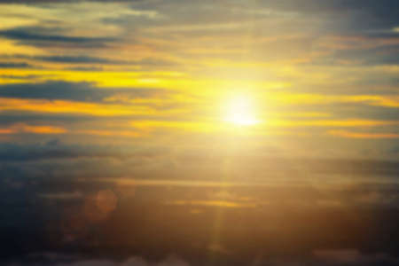 Relaxing outdoors vacation landscape concept: Abstract blurred sunlight beach colorful blurred bokeh background with retro effect autumn sunset sky have blue bright, white, and color orange calm.の写真素材