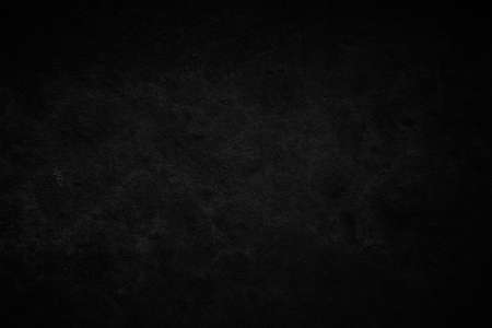 Black dark concrete wall background. Pattern board cement texture grunge dirty scratched for show anthracite promote product urban floor and abstract paper design element decor. Blackboard blank.の写真素材