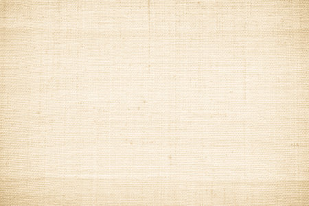 Natural linen texture for background. Beige canvas background. Close up.の写真素材