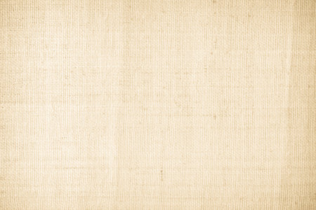 Closeup detail of beige linen texture background. High resolution photo.の写真素材