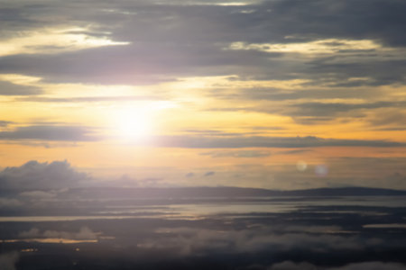Beautiful sunset over the sea with clouds and sunbeams.