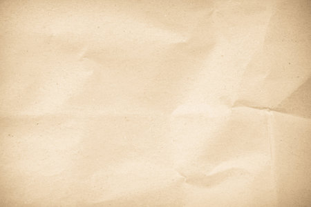 Brown crumpled paper texture or background for design with copy space for text.の写真素材