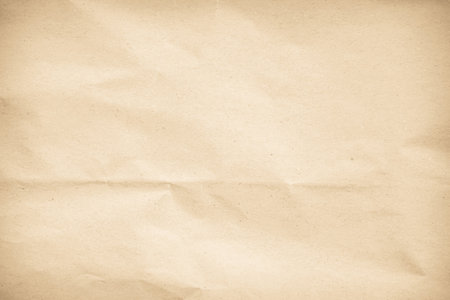 Brown crumpled paper texture or background for design with copy space for text.の写真素材