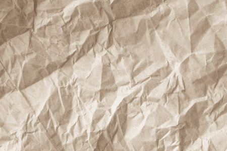 Brown crumpled paper texture or background for design with copy space for text.の写真素材