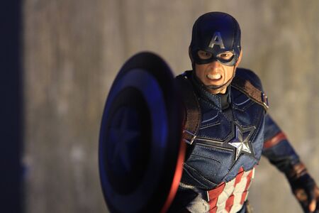 BANGKOK THAILAND - DECEMBER 17 ,2016 : Close up shot of Captain America Civil War superheroes figure in action fighting. Captain america appearing in American comic books by Marvel.のeditorial素材