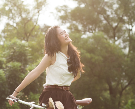 Young woman relaxing in the park.の写真素材